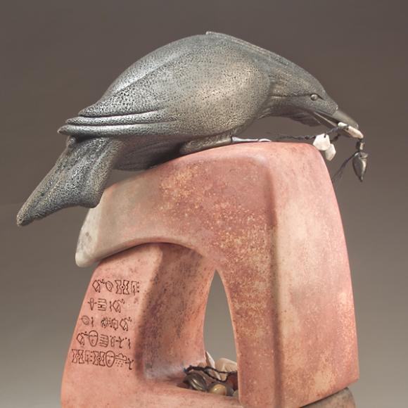 Raven on block sculpture