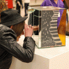 person viewing art at 2013 IMAGE Art Show